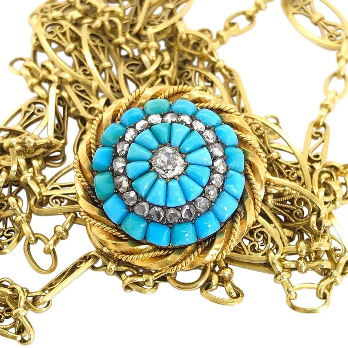 A magnificent piece with stunning bright blue matching turquoise and old cut diamonds, a gorgeous and eye-catching combination. 
This brooch is from an era when craftsmanship was done by hand, each small gem hand cut to fit into this pretty brooch.