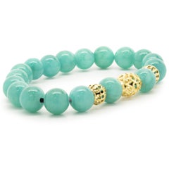 Bracciale in oro giallo 18 carati con perline di turchese