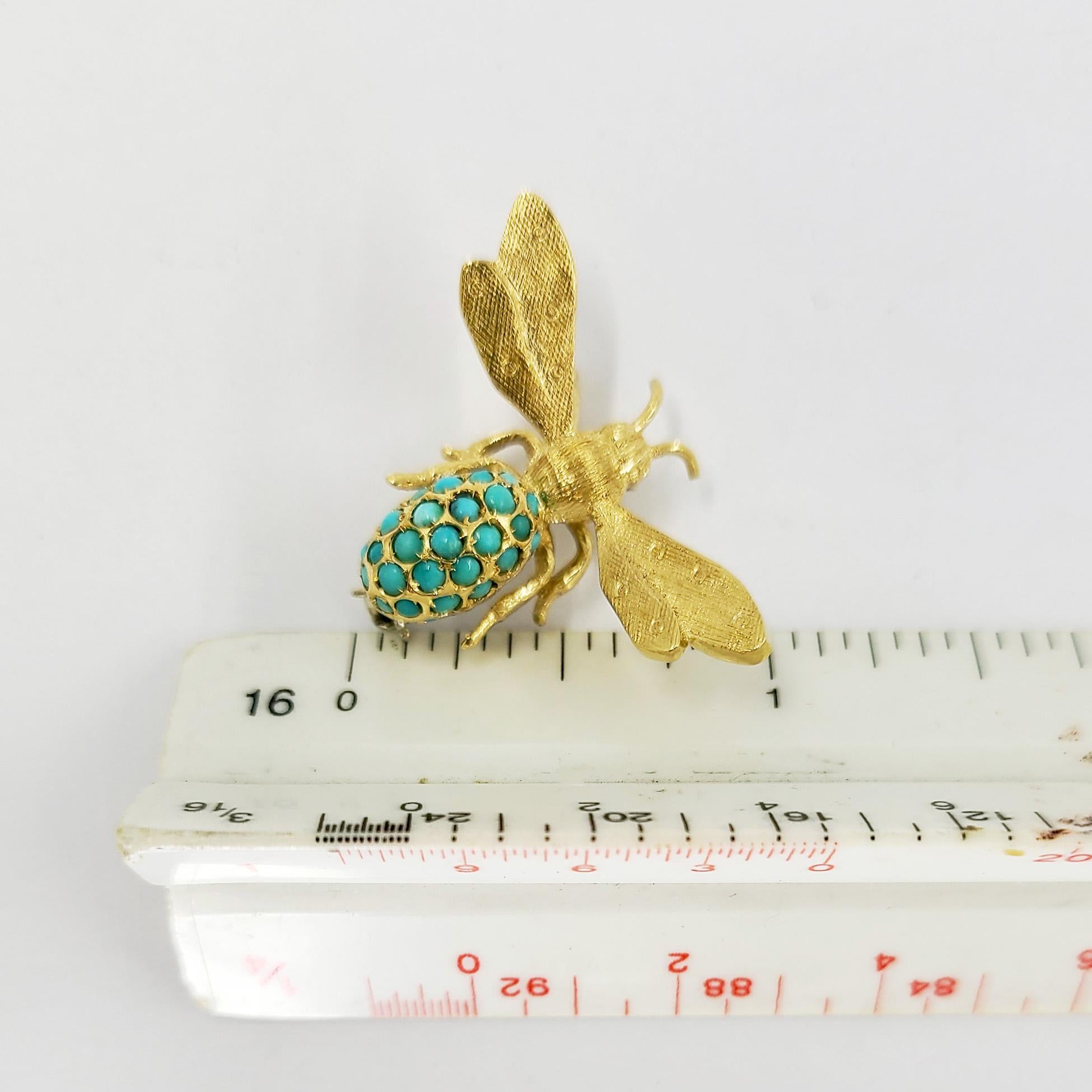 18 Karat Yellow Gold Insect Pin Featuring A Florentine Finish & Turquoise Body. 1 Inch Long By 1.5 Inches Wide. Finished Weight Is 5.0 Grams.