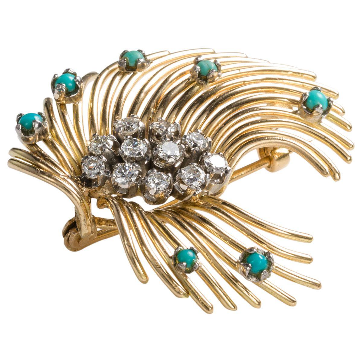 Elegant & stylish - a piece that can be worn on any outfit and it will add that finishing touch. A fabulous 1980's 18k yellow gold, turquoise and diamond spray brooch. Finely crafted with lovely detail it features 7 cabochon turquoise beads each