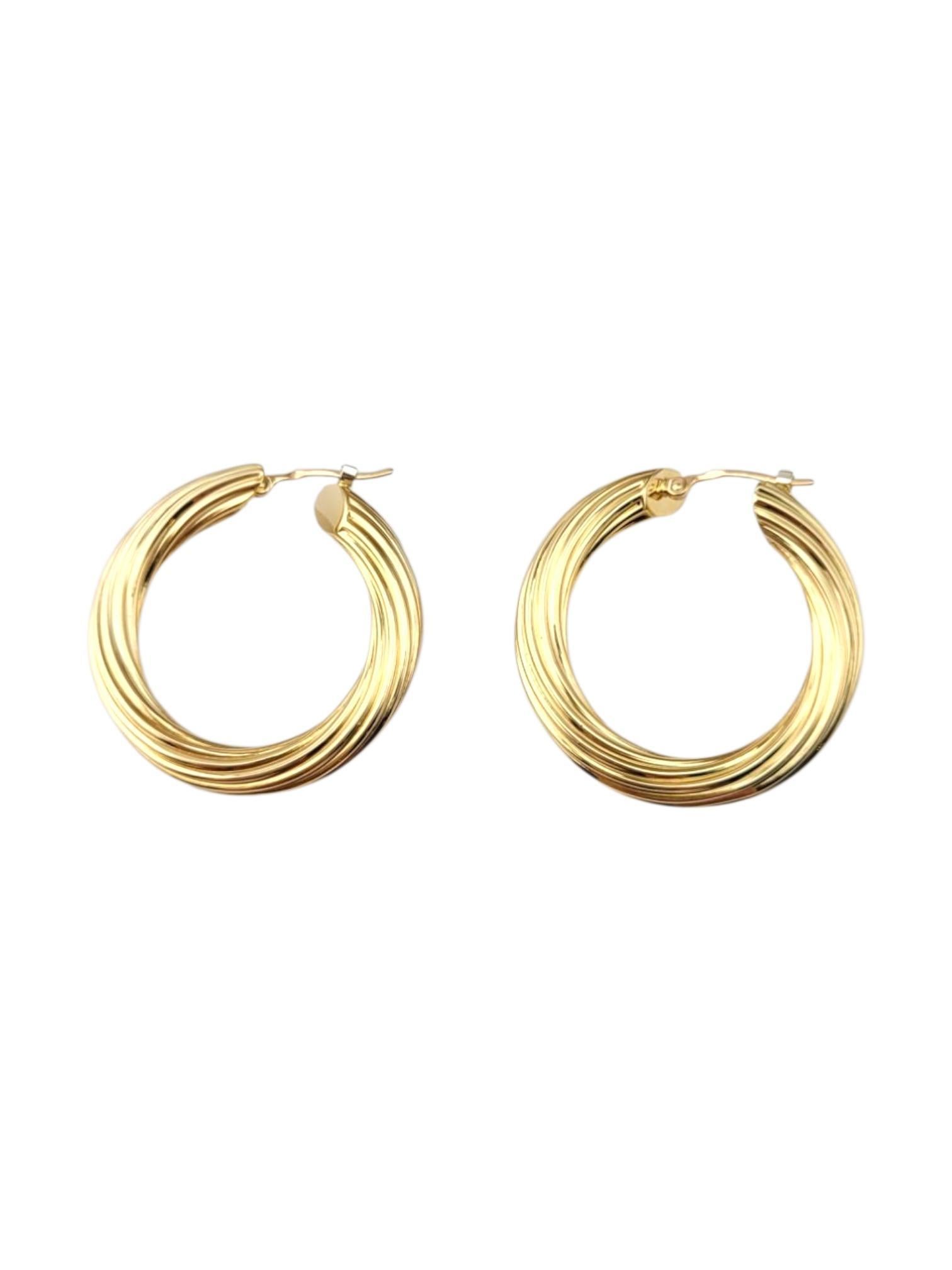 18 Karat Yellow Gold Twisted Hoop Earrings #21887