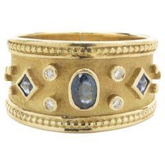 18 Karat Yellow Gold Vintage Bezel Set Sapphire and Diamond Cigar Band