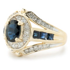 14 Karat Yellow Gold Vintage Oval Sapphire and Diamond Cocktail Ring