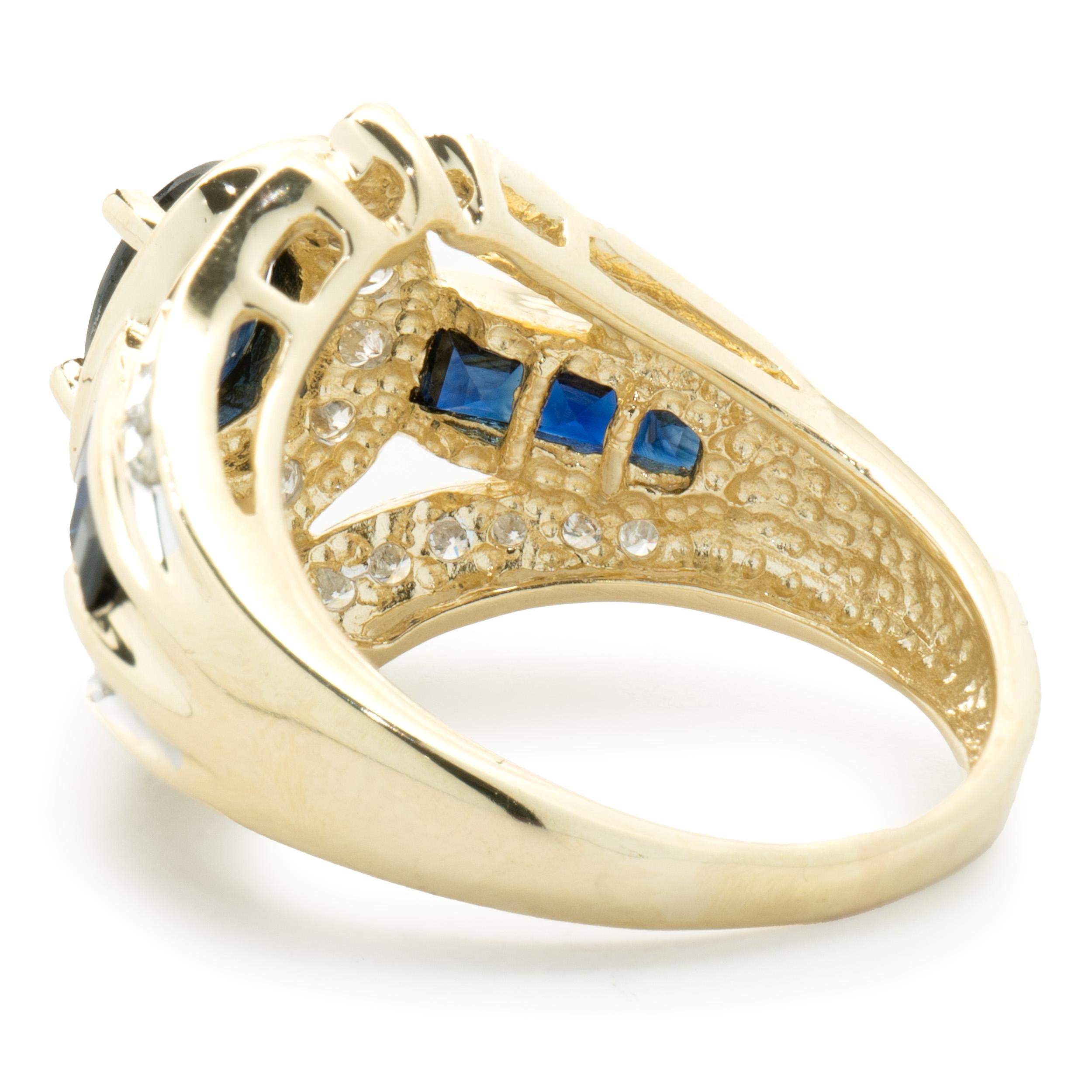 Oval Cut 14 Karat Yellow Gold Vintage Oval Sapphire and Diamond Cocktail Ring For Sale