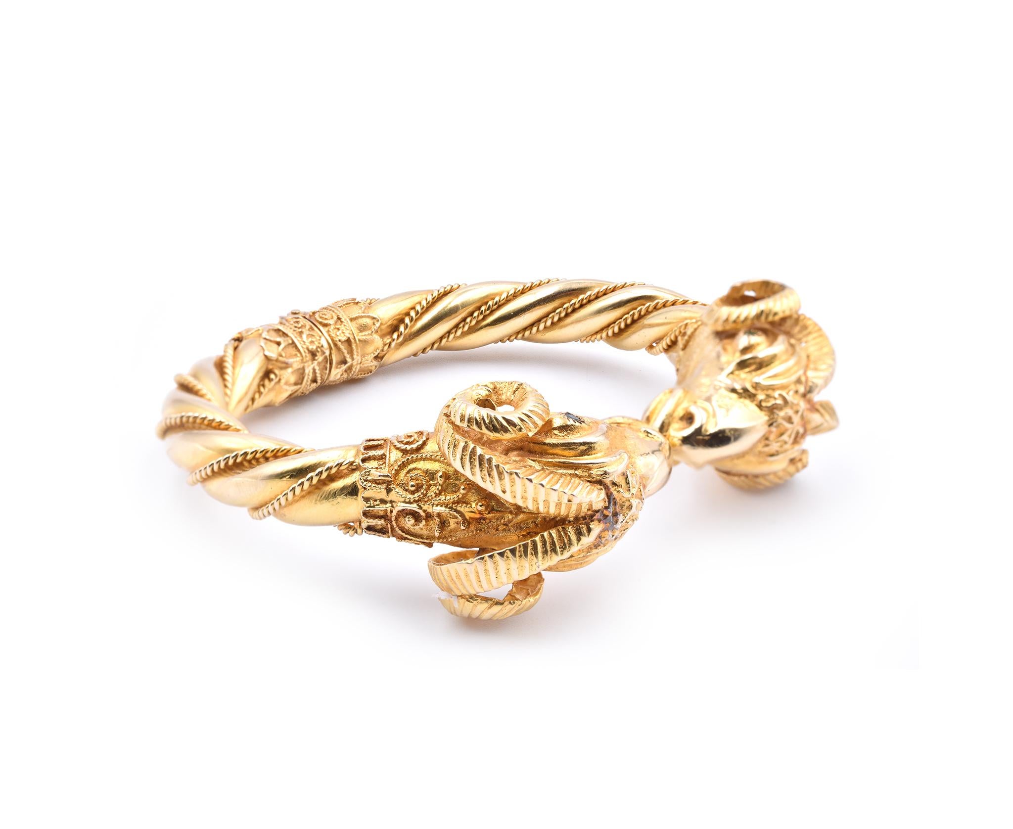 Designer: custom 
Material: 18k yellow gold
Emeralds: 4 round brilliant cuts= .08cttw
Dimensions: the bracelet will fit up to an 7.5-inch wrist
Weight: 55.49 grams
