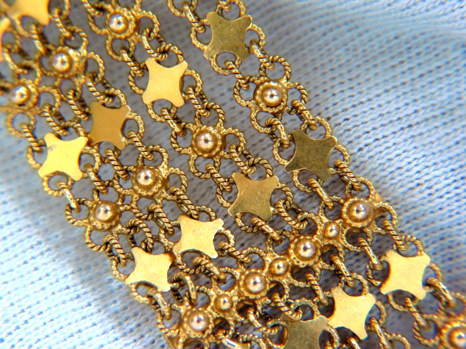 Vintage Wide

Prime Mesh / Bracelet charnière complexe.

7.50 pouces / longueur portable

38.6 grammes.

.95 pouce de large au niveau du fermoir

18kt marqué et testé.

Verrouillage et déverrouillage sûrs et confortables par 