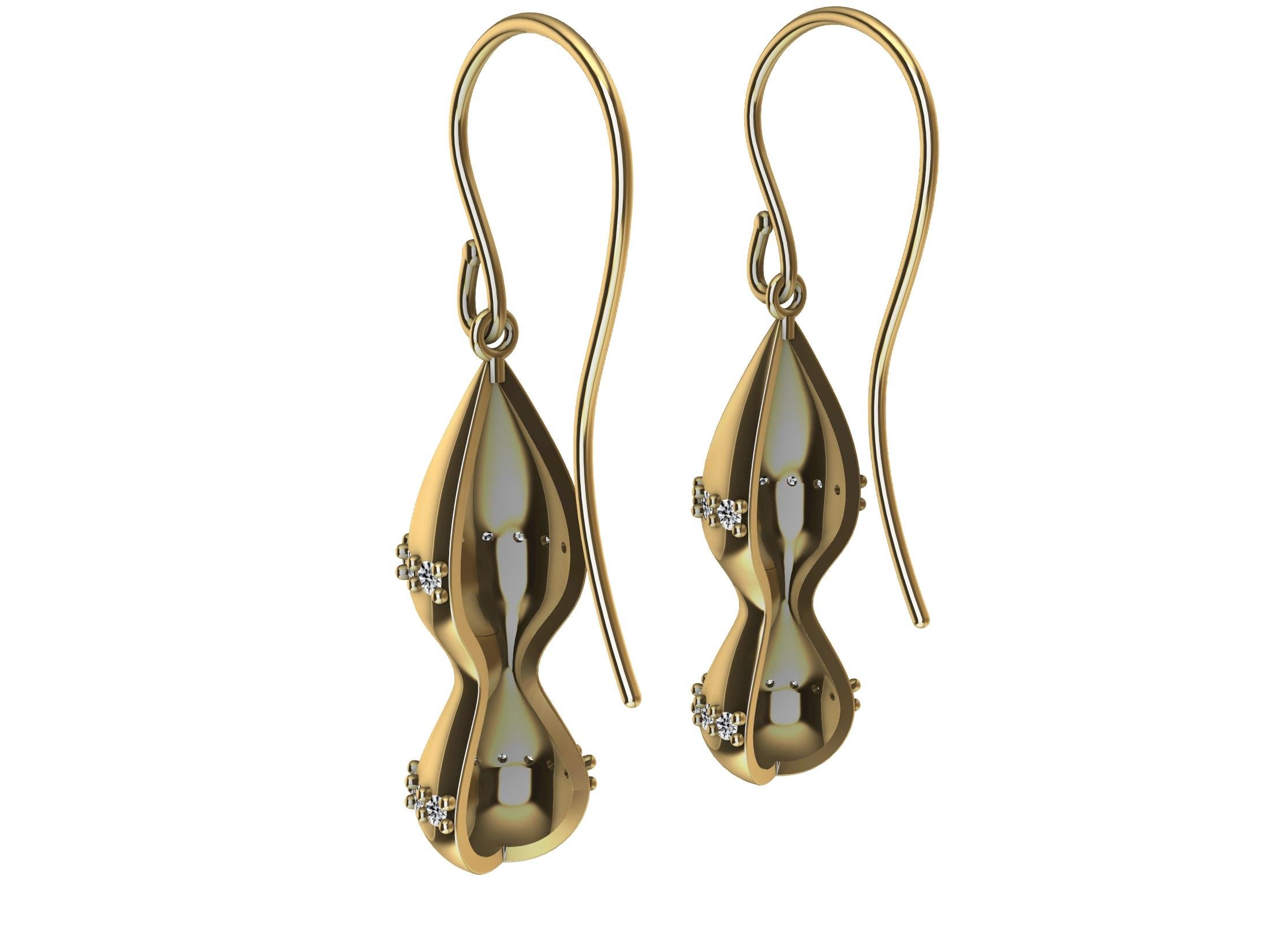 Tiffany Designer, Thomas Kurilla is keeping it simple on the eyes. Soft water drops with 48 diamonds to add some bling. Hollowed for comfort all day long into the evening. 18 karat yellow gold diamond dangle drops earrings. 30.30mm or 1 3/16  inch.
