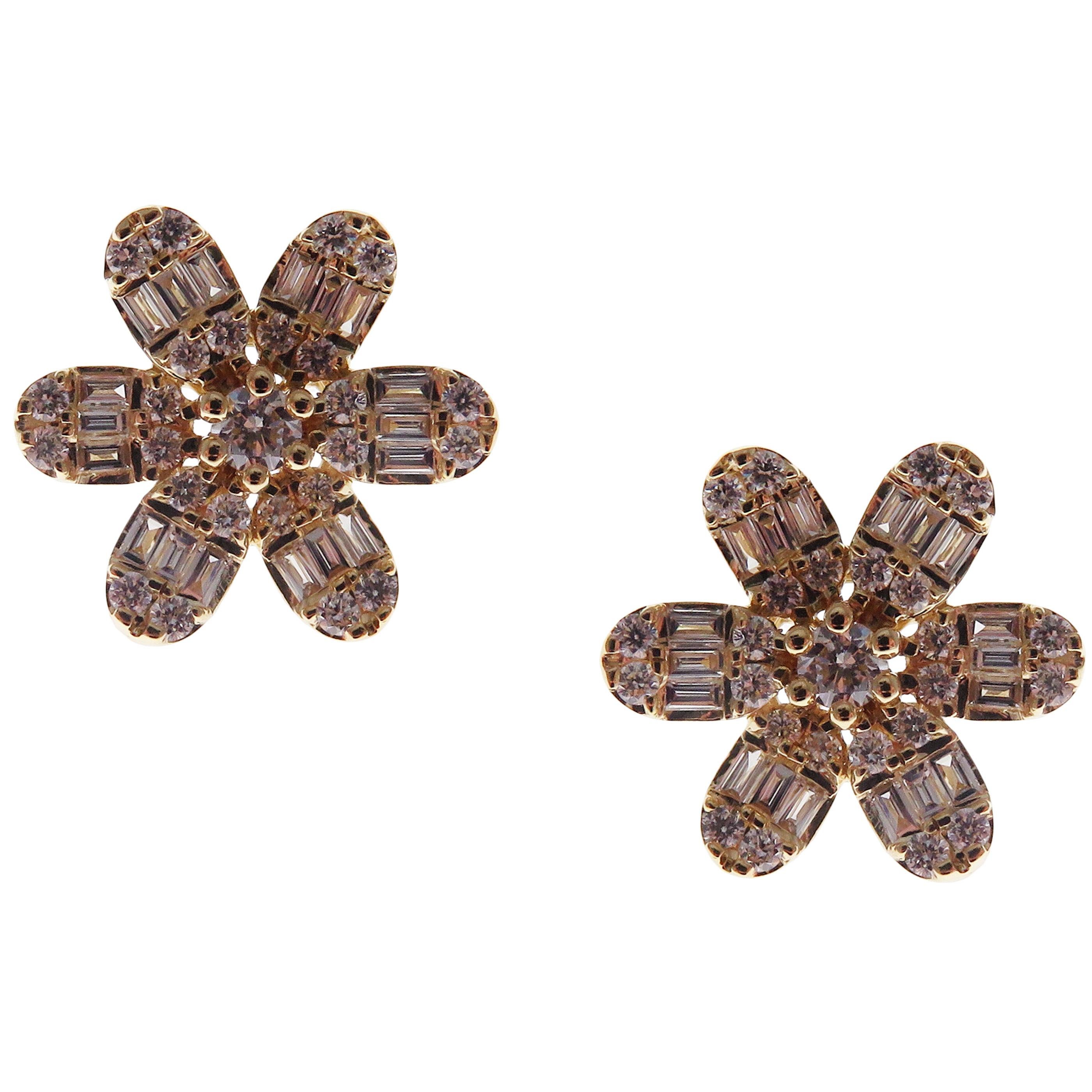 These classic flower stud earrings with round and baguette white diamonds are crafted in 18-karat white gold, featuring 50 round white diamonds totaling of 0.60 carats and 36 baguette white diamonds totaling of 0.39 carats.
These earrings come with