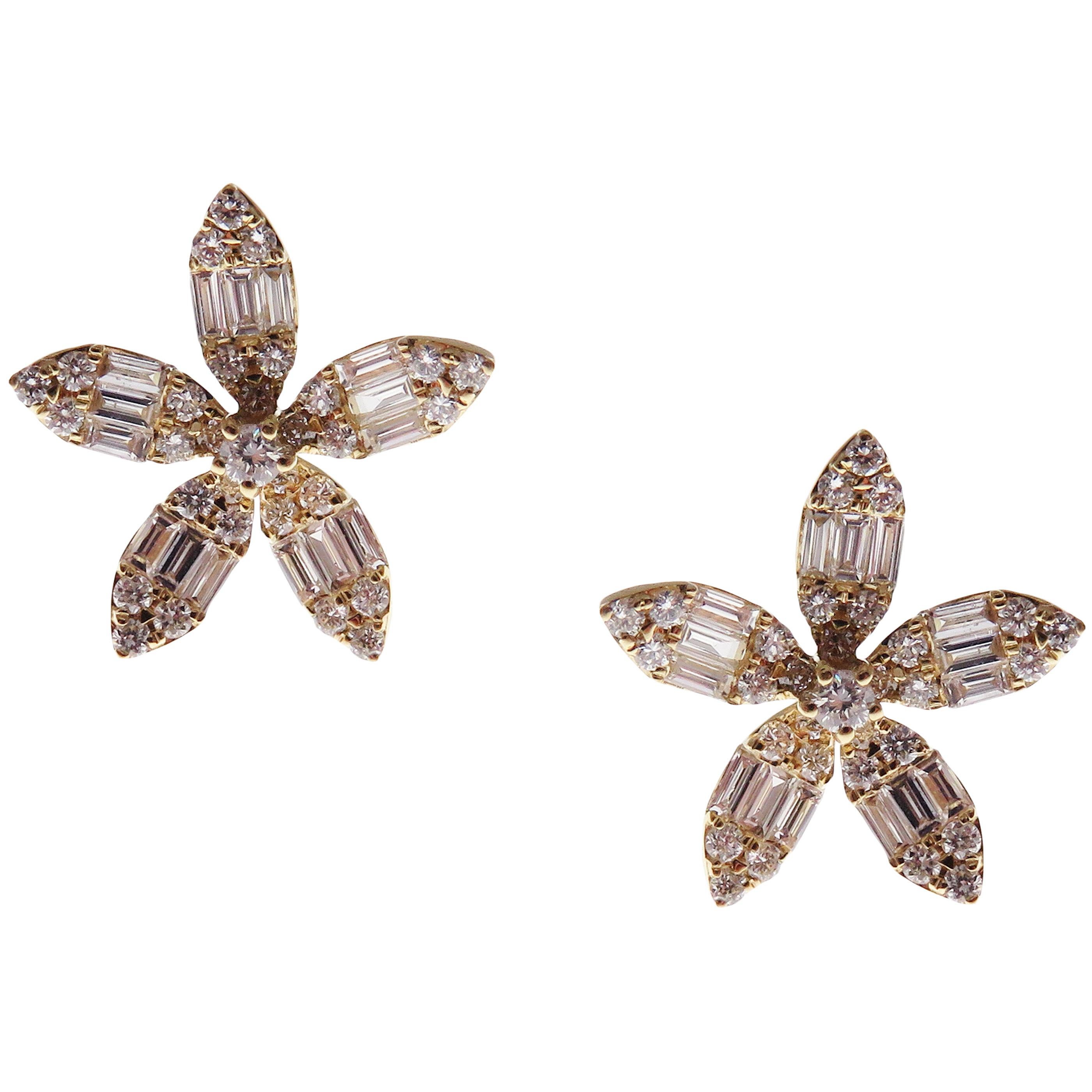 These classic flower stud earrings with round and baguette white diamonds are crafted in 18-karat yellow gold, featuring 62 round white diamonds totaling of 0.45 carats and 30 baguette white diamonds totaling of 0.50 carats.
These earrings come with