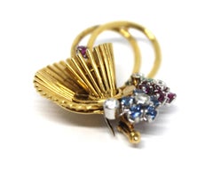 18 Karat Yellow Gold, White Diamond, Blue Sapphire and Ruby Spray Brooch