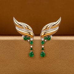 18 Karat Yellow Gold, White Diamonds and Emeralds Wing Earrings