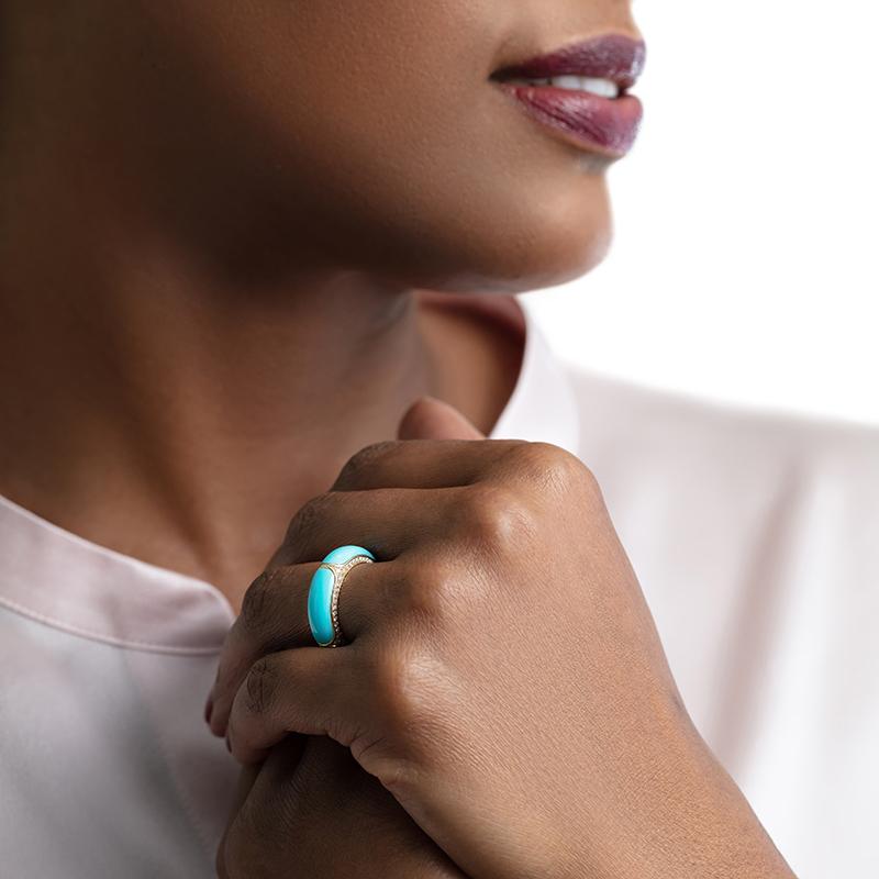 New additions to our iconic Nile collection. This new edition features bold shapes and chunky volumes, adorned with our unique Nile arabesque motif.

Ring crafted in 18K Yellow Gold and Turquoise (7mm)
Round Brilliant Diamonds GVS+ = 0.57 ct
Ring
