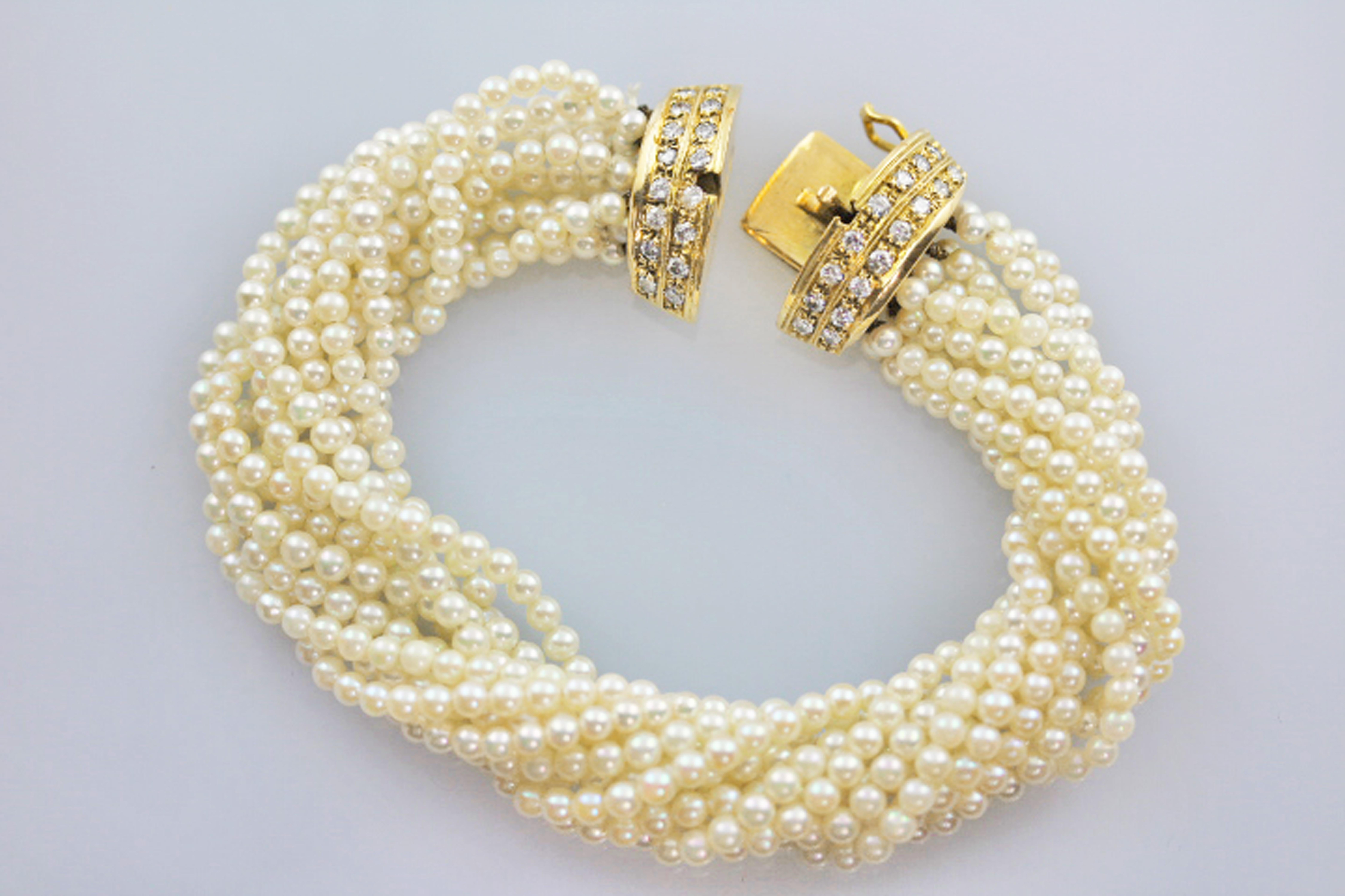 18 Karat Yellow Gold White Diamonds Multi Strand Pearls Vintage Bracelet 1