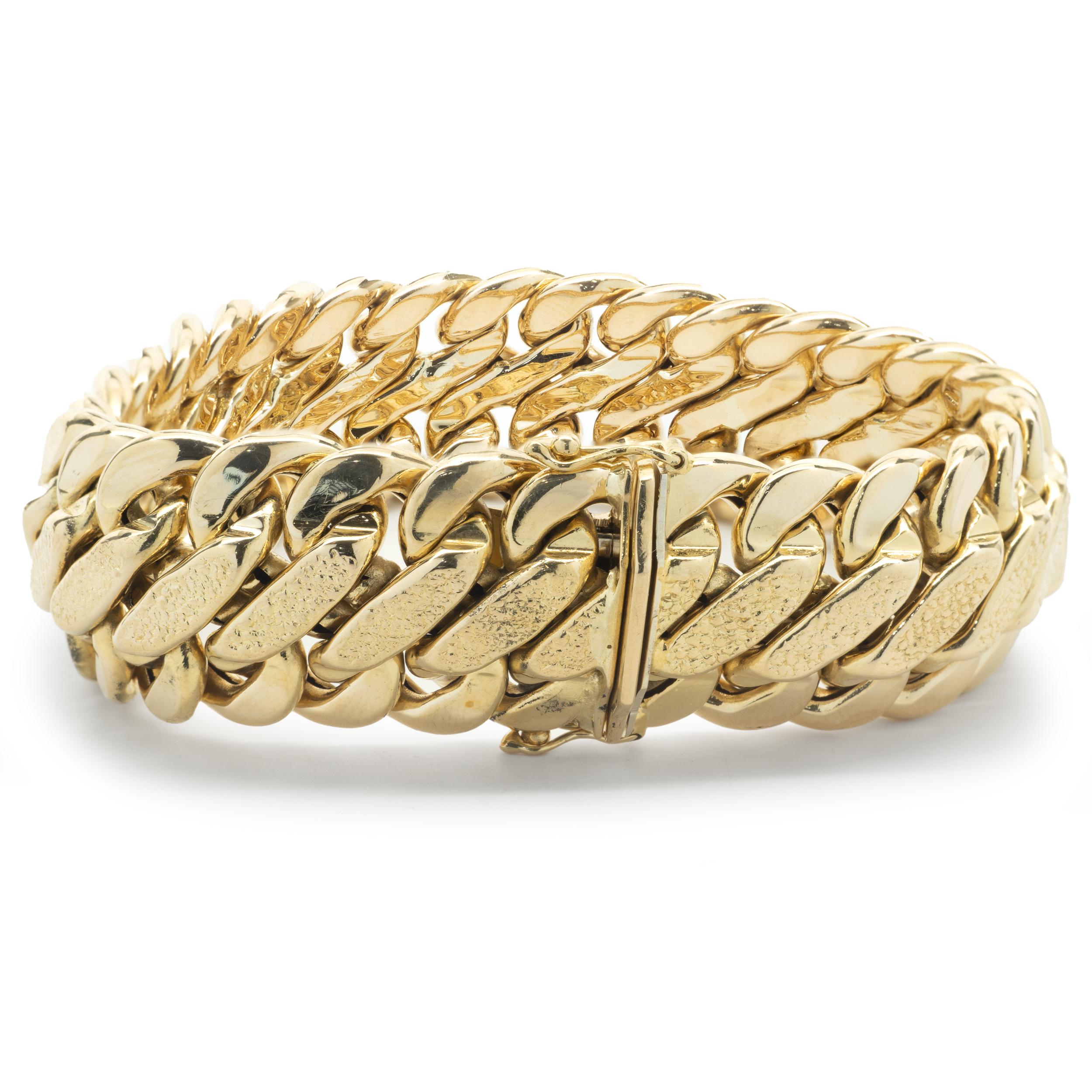 Designer: custom 
Material: 18K yellow gold
Dimensions: bracelet will fit up to a 8-inch wrist
Weight: 58.82 grams
