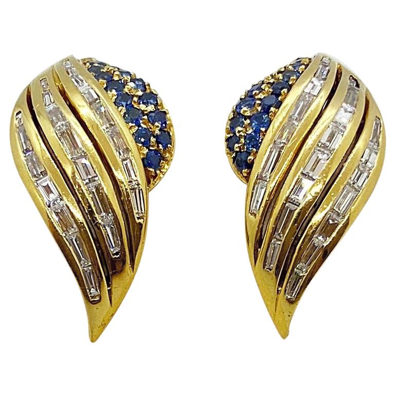 18 Karat Yellow Gold Winged Earrings with Baguette Diamonds and Blue Sapphires For Sale