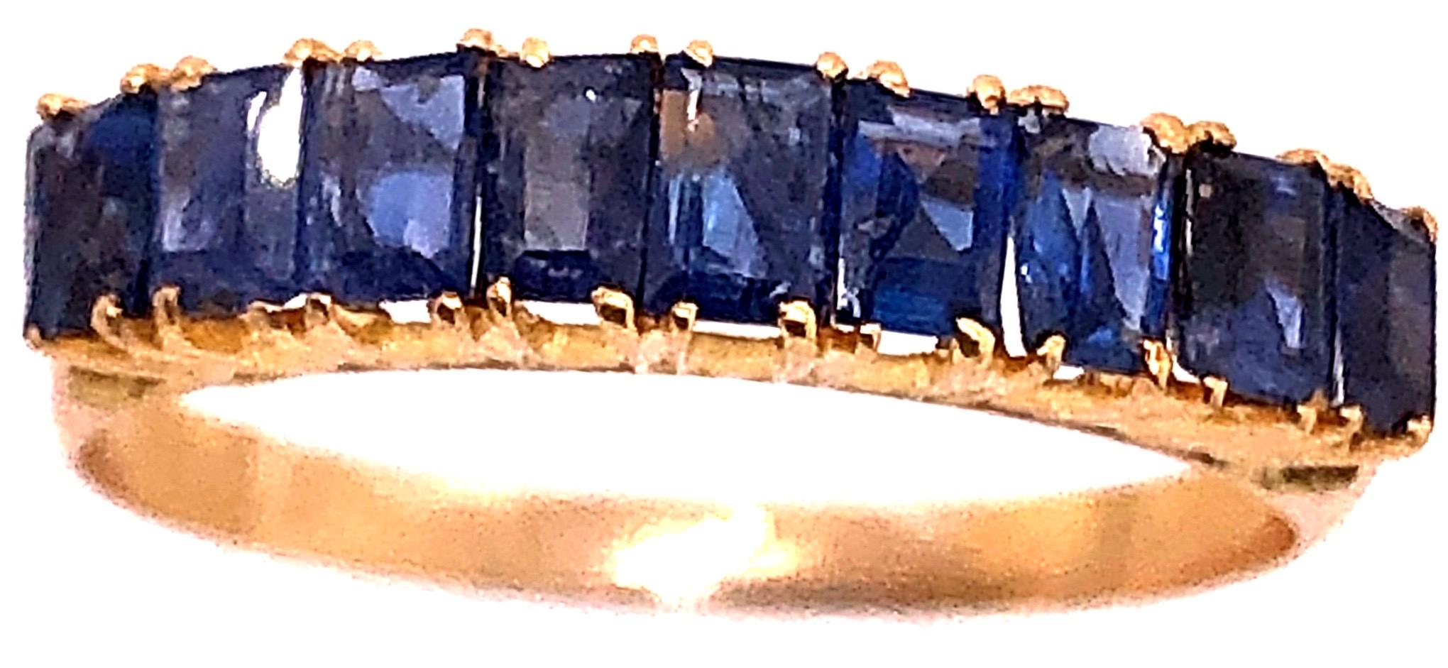 18 Karat Yellow Gold with Nine Sapphire Baguettes Band / Ring In Good Condition For Sale In Stamford, CT