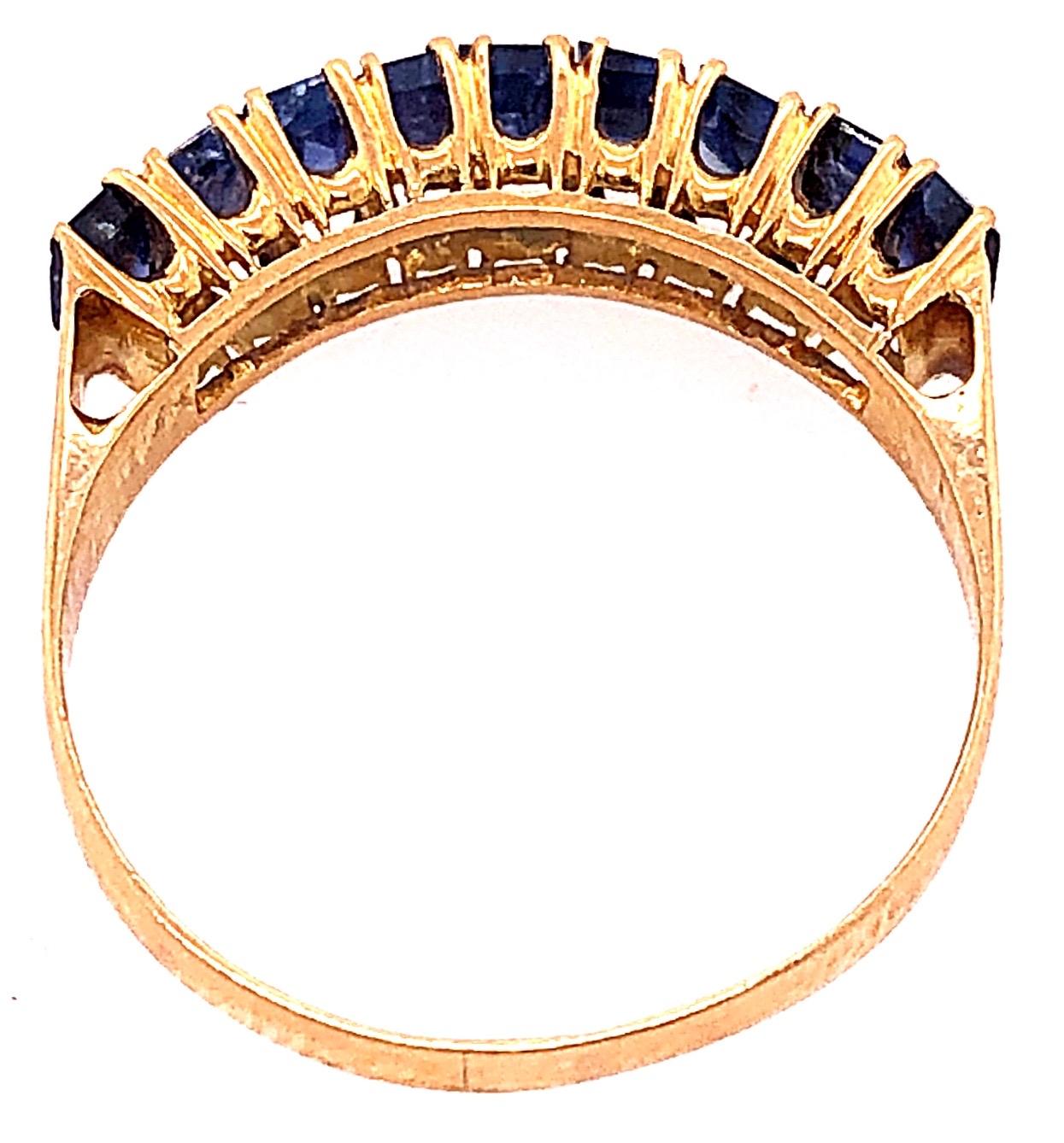 Women's or Men's 18 Karat Yellow Gold with Nine Sapphire Baguettes Band / Ring For Sale