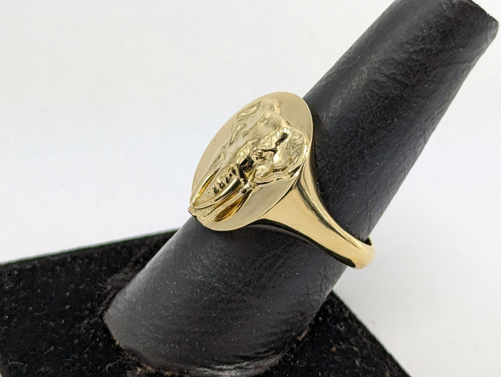 For Sale:  18 Karat Yellow Gold Women's Elephant 2 Tusks Signet Ring 5