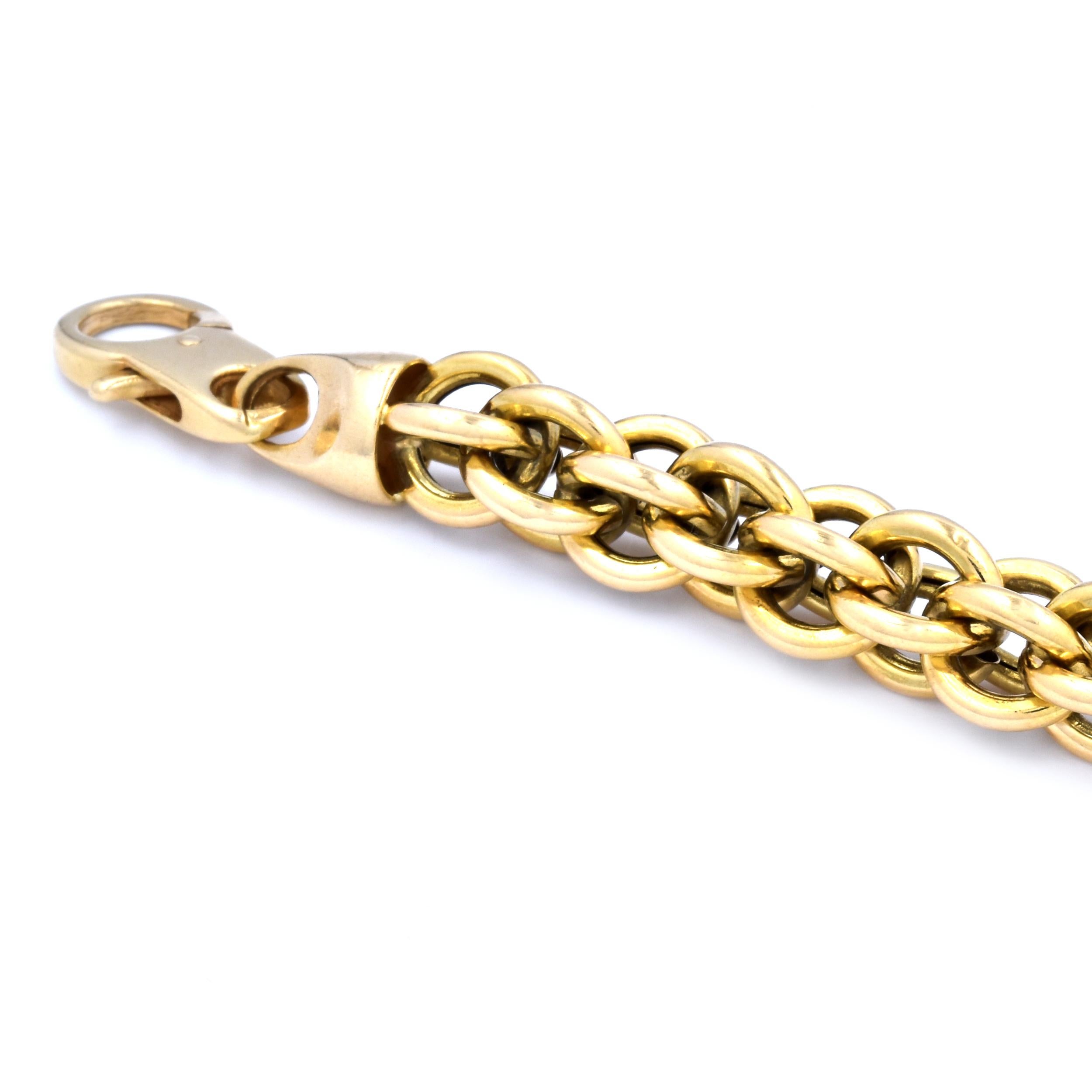 Designer: custom
Material: 18K yellow gold
Dimensions: bracelet will fit up to a 8-Inch wrist
Weight: 27.67 grams
