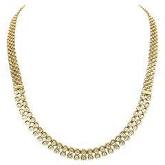 18 Karat Yellow Gold Woven Link Necklace with Bezel Set Diamond Circle Motif