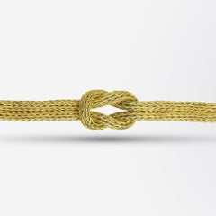 18 Karat Yellow Gold, Woven Rope Lovers Knot Bracelet