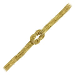 18 Karat Yellow Gold, Woven Rope Lovers Knot Bracelet