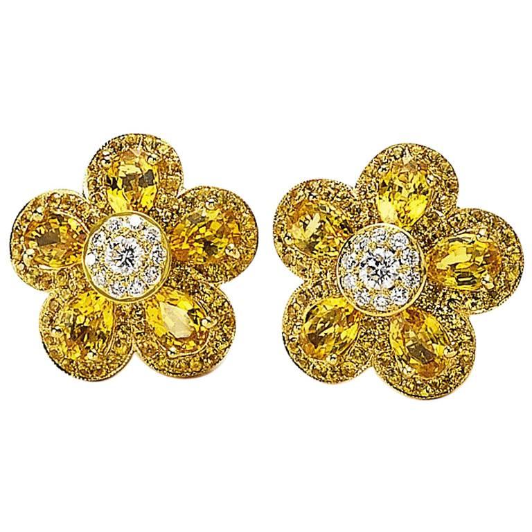 Boucles d'oreilles fleur en or jaune 18 carats et saphir jaune