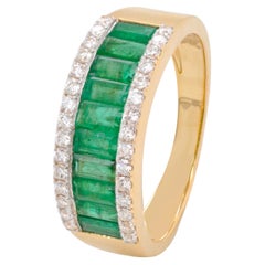 18 Karat Gelbgold sambischer Smaragdring mit Diamanten im Baguetteschliff