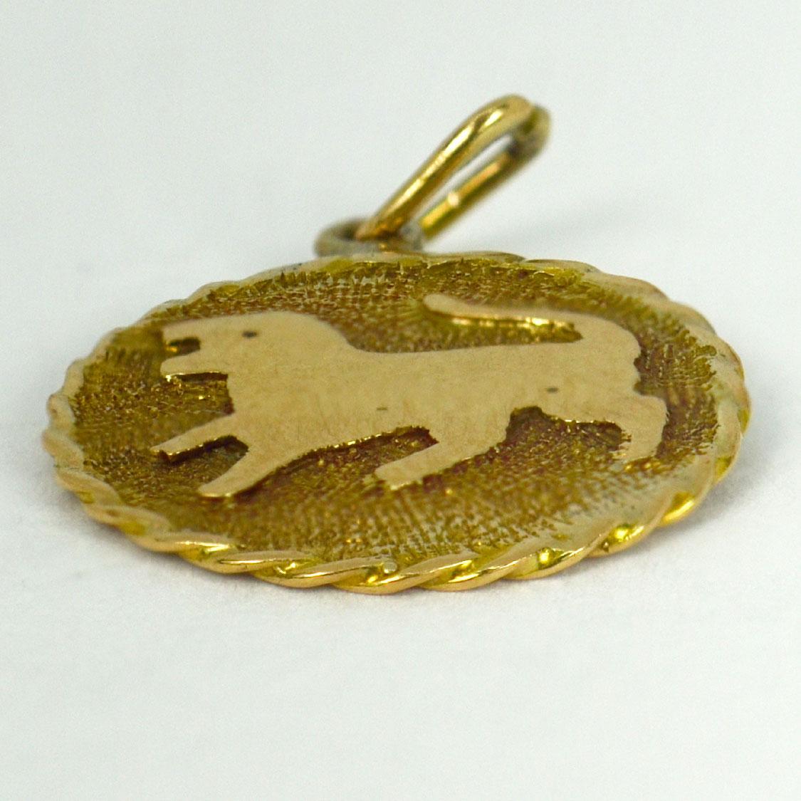 An 18 karat (18K) yellow gold charm pendant designed as a disc depicting a lion to represent the Zodiac sign of Leo. Stamped with the owl mark for French import and 18 karat gold, engraved to the reverse ‘Ma Rosa’.

Dimensions: 1.7 x 1.5 x 0.5 cm