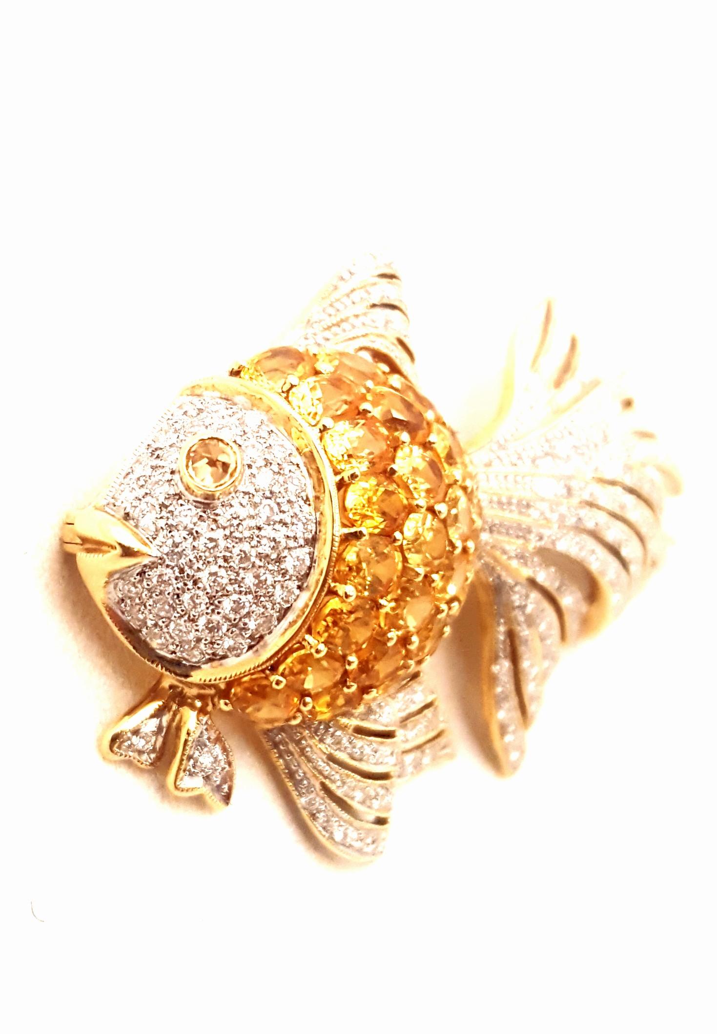 In 2006, this fabulous Fish sold at Neiman Marcus for $12000!  Not so today!  Fabricated in 18 karat yellow gold, this fan tail beauty boasts a body bursting with bright oval yellow sapphires with an approximate total weight of 6.00 carats.  A