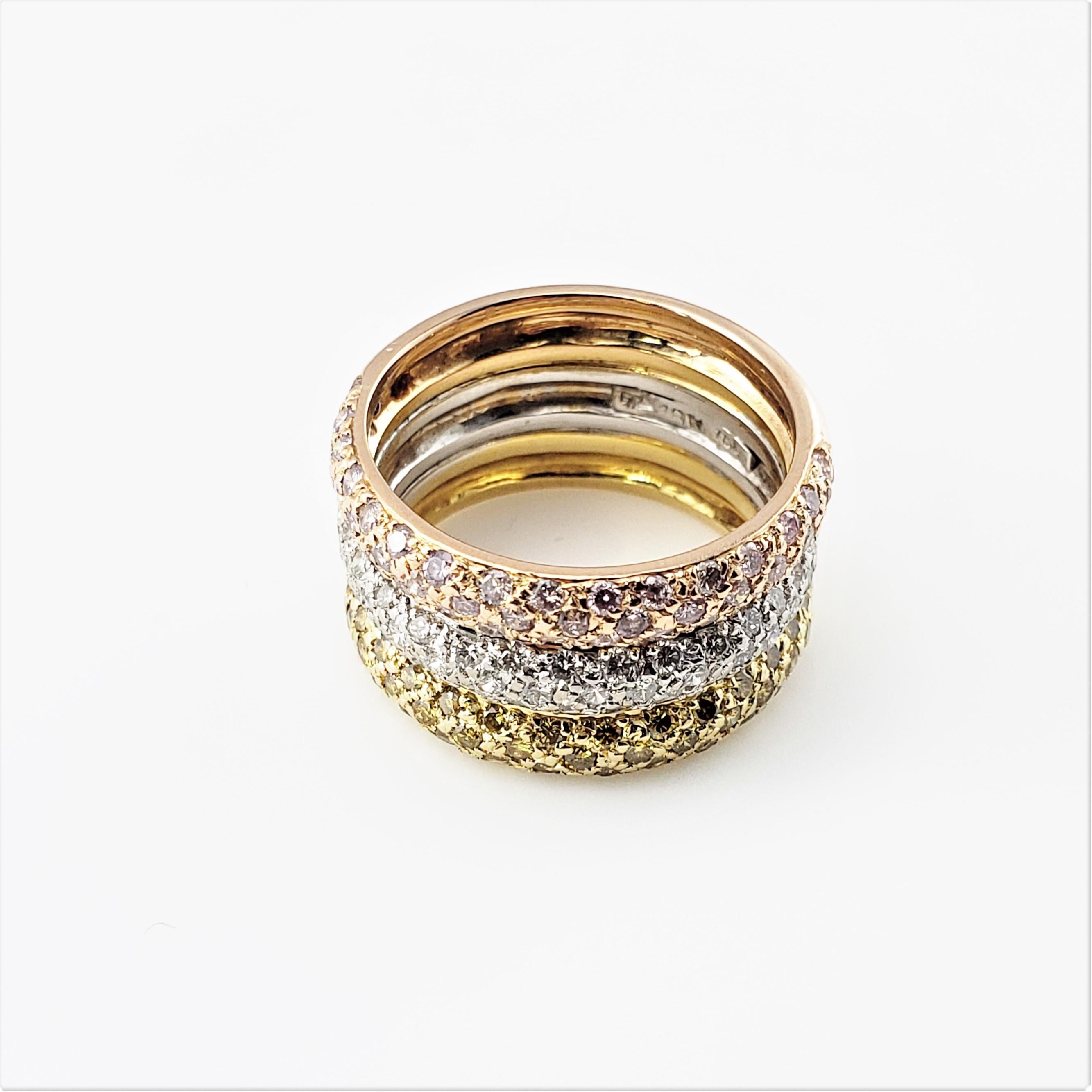 18 Karat Yellow, White and Rose Gold and Diamond Triple Band Ring Size 6.5-

This stunning ring features three fixed bands in rose, white and yellow 18K gold decorated with 147 round brilliant cut diamonds. Diamonds in rose gold band are color