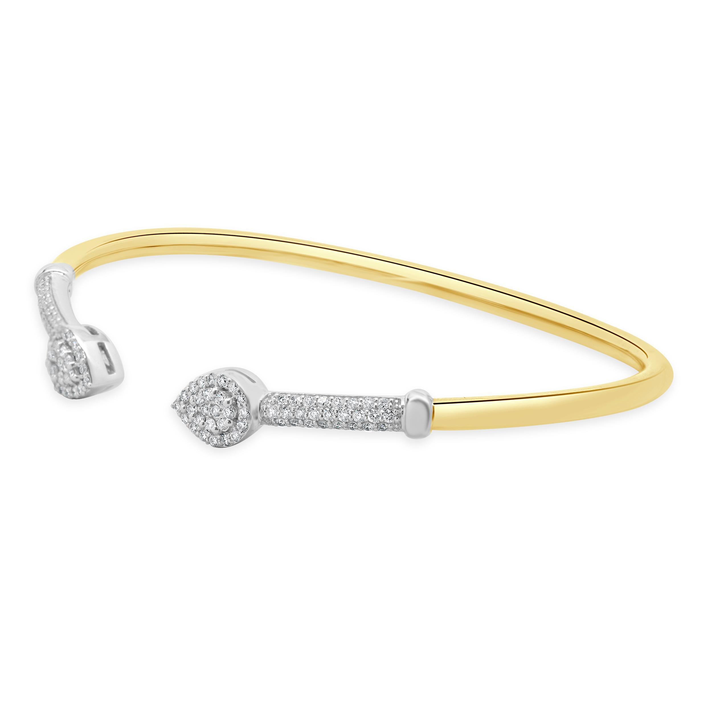 MATERIAL : Or jaune et blanc 18K
Diamants : taille ronde brillante = 0,56cttw
Couleur : G
Clarté : SI1
Dimensions : le bracelet convient à un poignet de 6.5 pouces maximum.
Poids : 8,70 grammes
