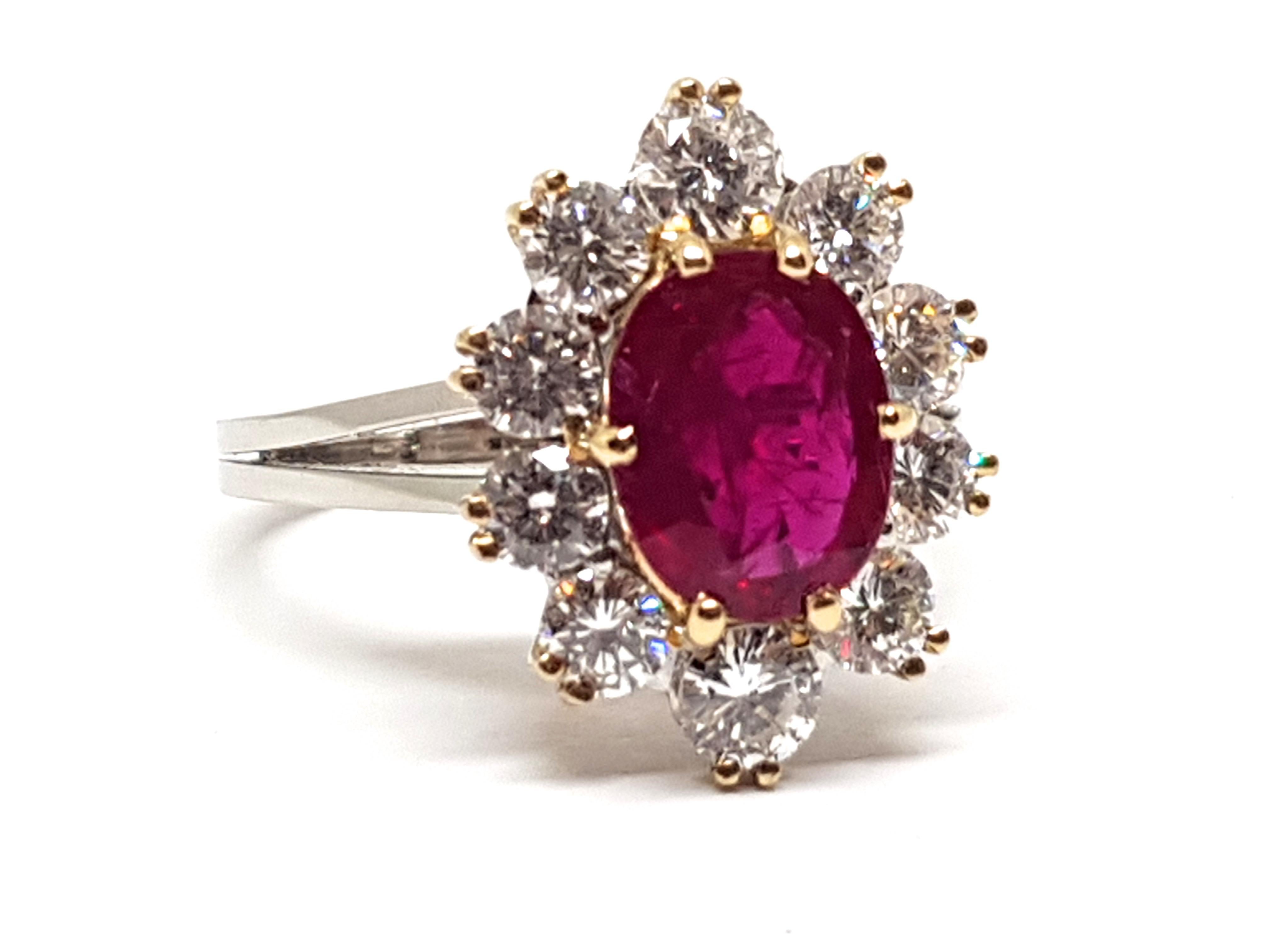 Gold: 18 Karat Yellow & White Gold 
Weight: 6.00 grams.
Diamond: 1.20 ct. Colour: E clarity: VVS1
Natural Ruby: approx. 1.50ct.
Width: 0.66 inches.
Ring size: US 6.50
Free resizing of Ring up to size US 13
All our jewellery comes with a certificate