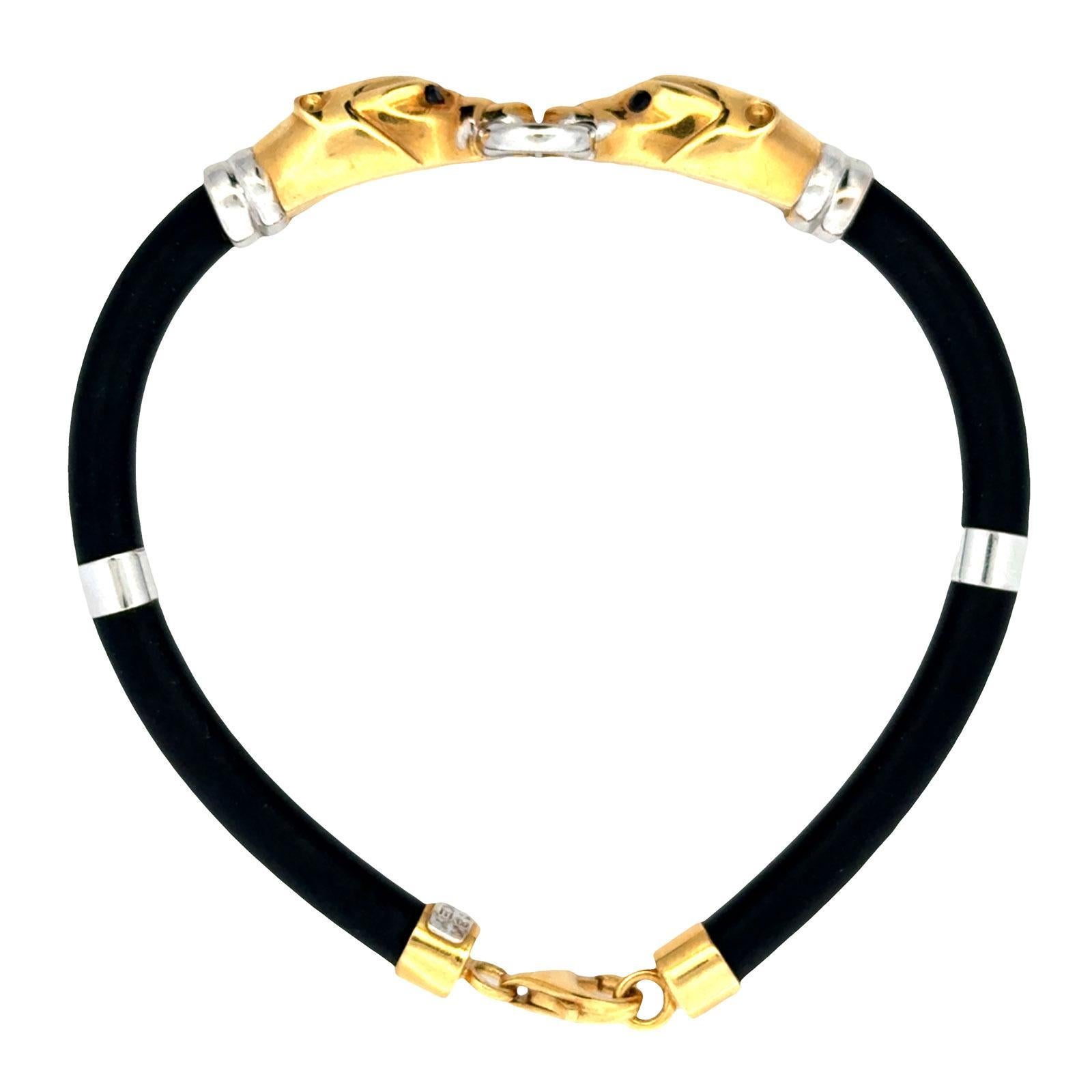 Bracelet en or jaune et blanc 18 carats avec panthère à double tête et cordon en caoutchouc noir Excellent état - En vente à Boca Raton, FL