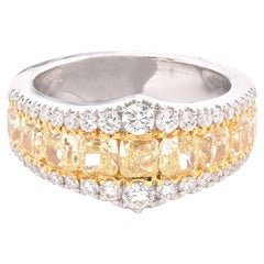 18 Karat Yellow 
White Gold Fancy Yellow and White Diamond Fashion Band