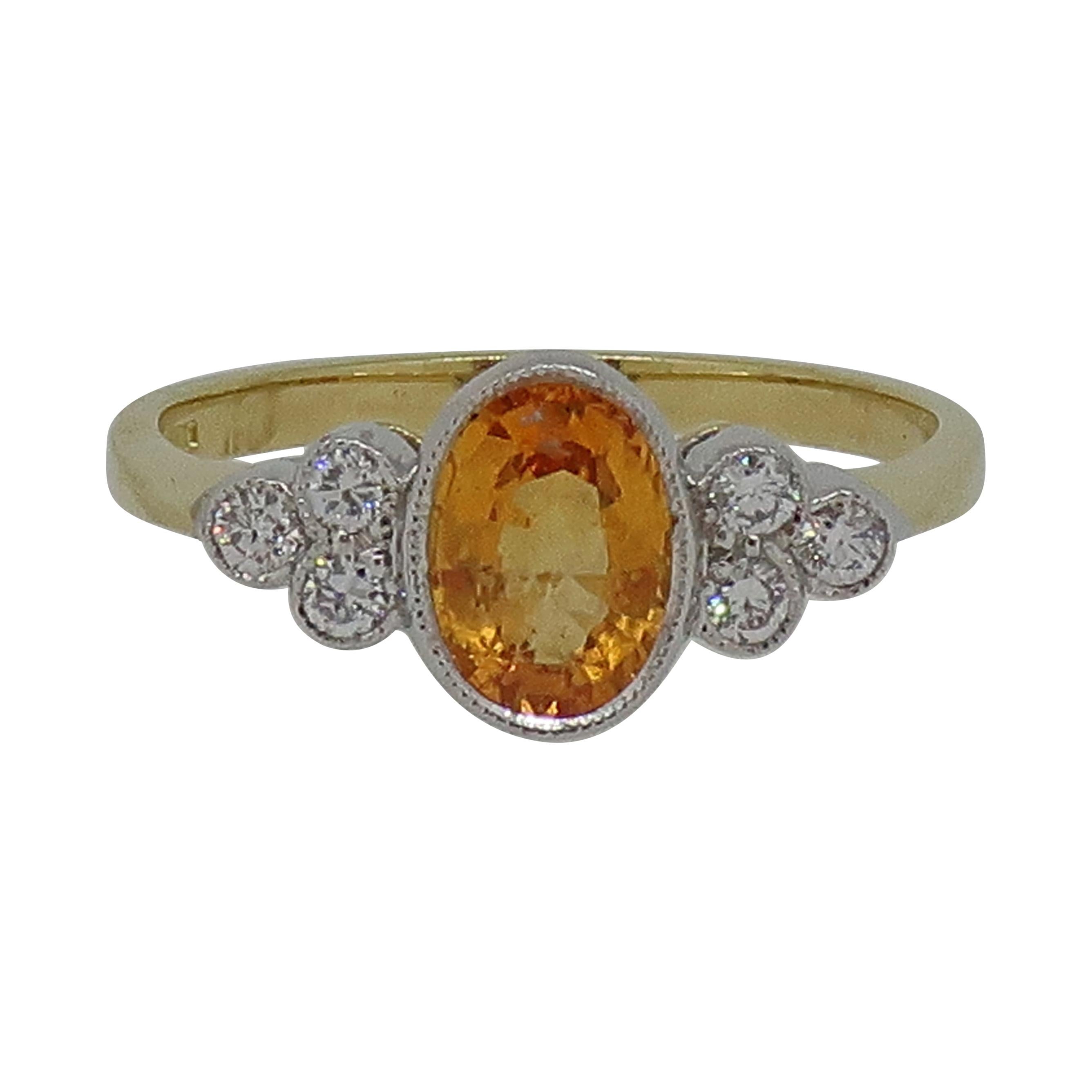 18 Karat Yellow & White Gold Oval Yellow Sapphire and Diamond Ring For Sale