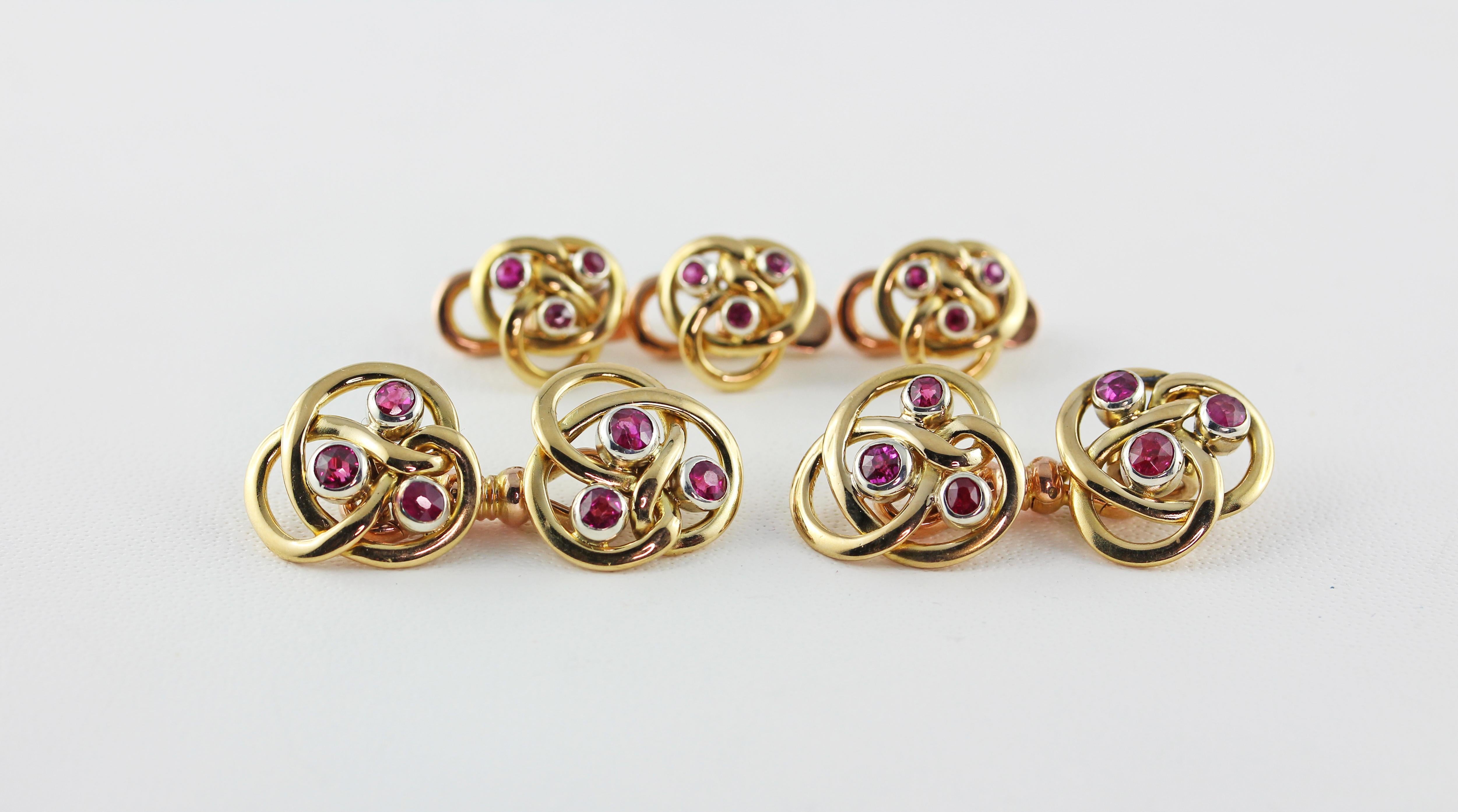 Set Tuxedo Cufflinks and buttons made in 18 Karat Yellow gold, each element is adorned by three rubies at the center and mounted in 18 karat white gold. 
The three buttons have been created as the cufflinks but smaller.
The closer of the buttons is