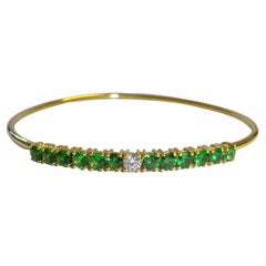 Bracelet en or jaune 18 carats, diamants et tsavorites