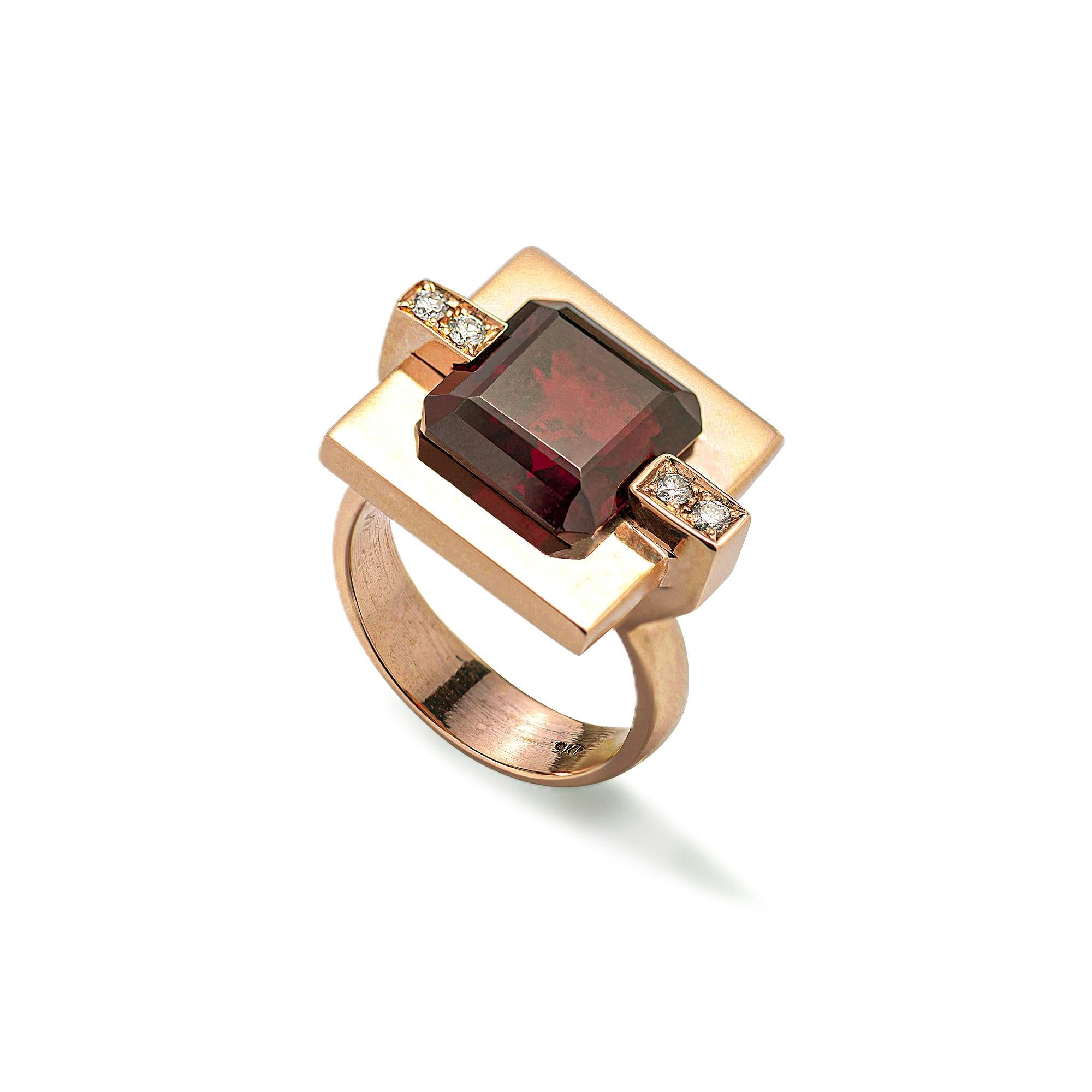 18 Karats Garnet 0.08 Karat White Diamonds Yellow Gold Cocktail Design Ring
This Modern 18 Karats Yellow Gold 0.08 Karat White Diamonds Cocktail Design Ring is entirely manufactured, in an artisanal way, in Rome, Italy and every step of the process