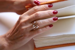18 Karats Rose Gold Brilliant Cut White Diamonds Unisex Trilogy Design Ring