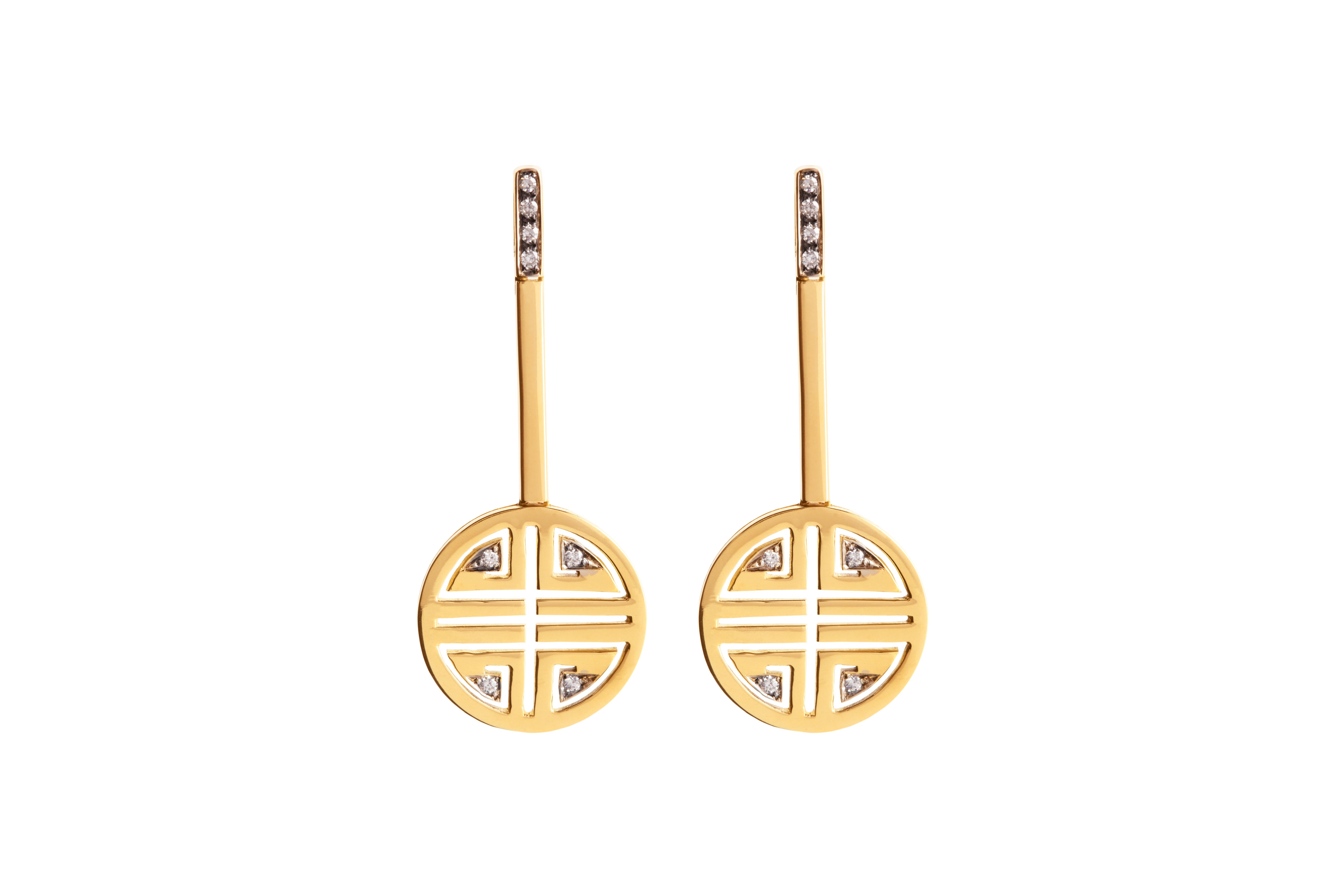 Rossella Ugolini Design Collection, these exquisite handmade yellow gold earrings are a unique statement piece that captures the essence of elegance and joy. 
The earrings feature a bar of sparkling diamonds on the lobe, followed by another bar, and