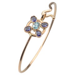 Brazalete de oro amarillo de 18 quilates con aguamarina y zafiro Brazalete moderno con diseño de flores