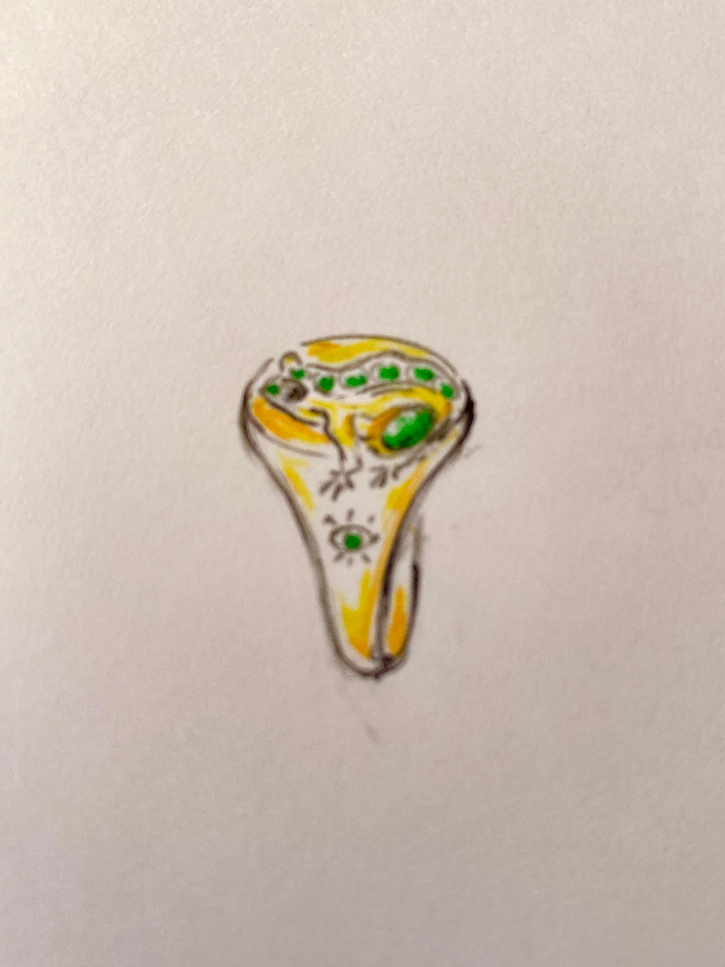 Rossella Ugolini 18k Yellow Gold Emeralds White Diamonds Green Agate Man Frog Ring . 
This handcrafted 18K yellow gold signet ring features a meticulously hand-carved frog in relif, sculpted in wax and set atop the ring as if pausing mid-movement.