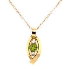 18 Karats Yellow Gold Peridot Diamond Pendant