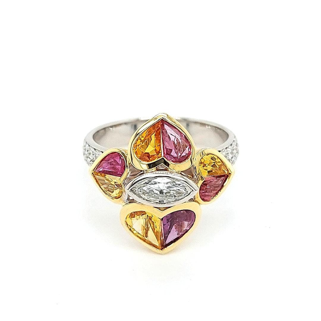 18 Kt Bicolor Ring With 0.85 Carat Diamonds & 2.47 ct. Heart Cut Precious Stones  

Beautiful and unique solid 18 kt gold bi color ring with Marquise diamond in the center, brilliant cut diamonds and precious colored stones.

The Rubies and