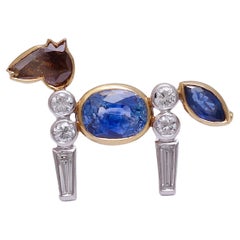 18 kt. Bicolor Gold Horse Pin / Brooch With 1.6 ct. Diamond & 2.78 ct. Sapphire