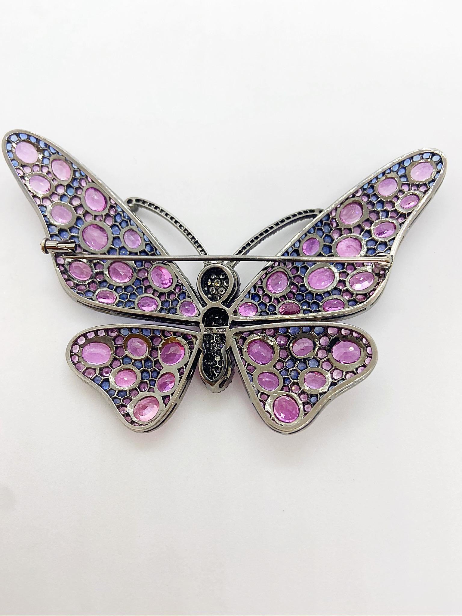 Oval Cut 18 Karat Blackened Gold Butterfly Brooch with Diamonds, Pink and Blue Sapphires For Sale