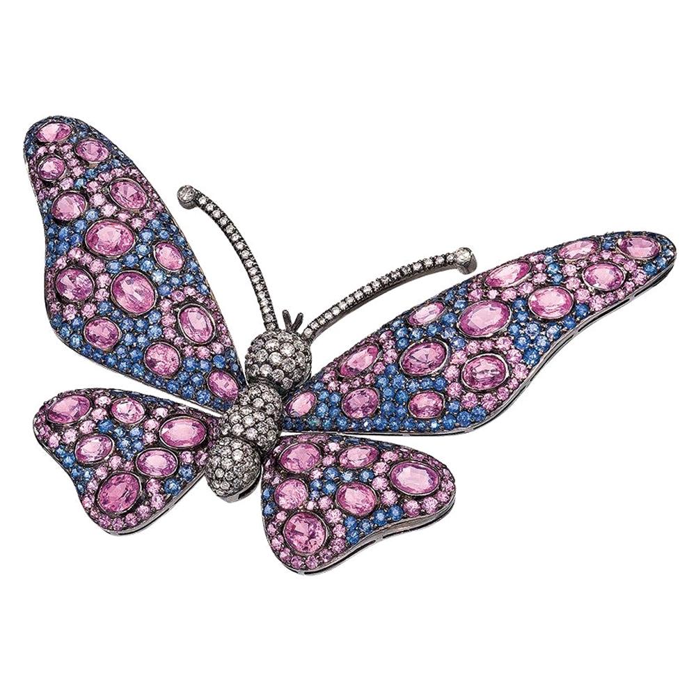 18 Karat Blackened Gold Butterfly Brooch with Diamonds, Pink and Blue Sapphires For Sale
