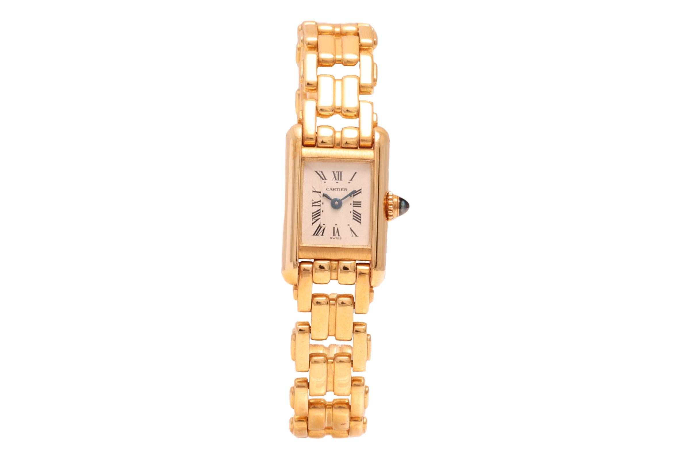 VERY CUTE AND COLLECTIBLE MINI SOLID 18 KT GOLD CARTIER PARIS WATCH

MOVEMENT: quartz

FUNCTIONS: hours, minutes

CASE: 18 kt yellow gold, diameter 15.5 mm x 24.1 mm, mineral glass, back secured with 4 screws, regular crown with cabuchon