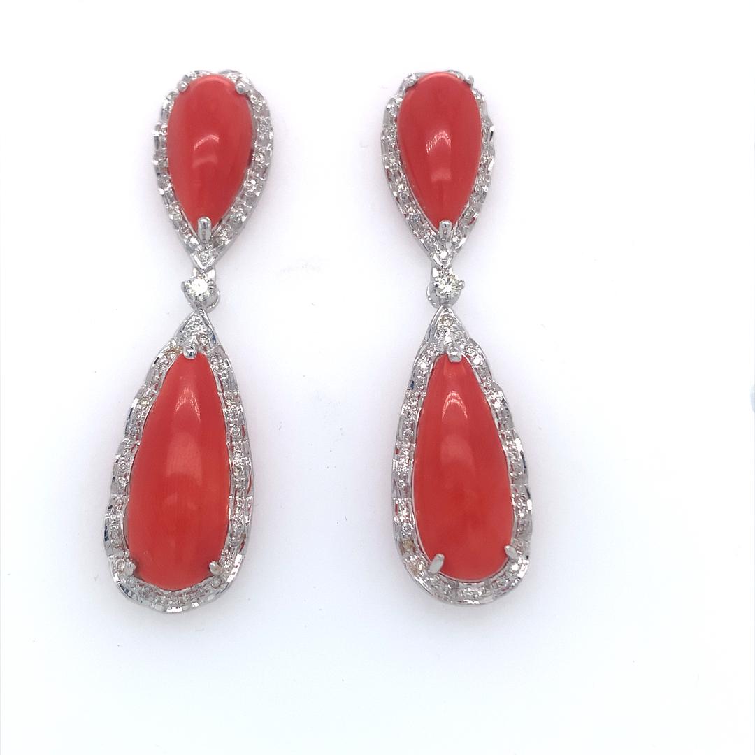 24.26 Carat Coral and 0.91 Carat Diamond Dangle earrings set in 18 Kt White gold